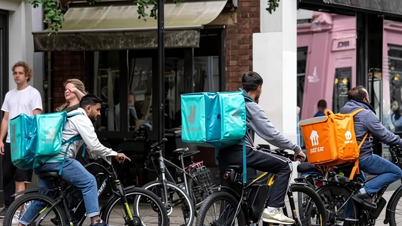 Delivery couriers at work in London. An academic study shows that 15% of food delivery companies in England do not have storefronts.