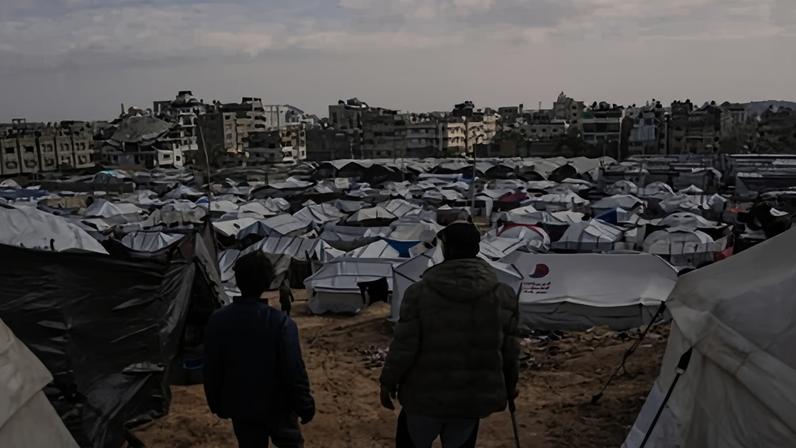View of makeshift tents at a camp for displaced people in Gaza City. Tent poles are on a long Israeli blacklist of ‘dual-use’ items.