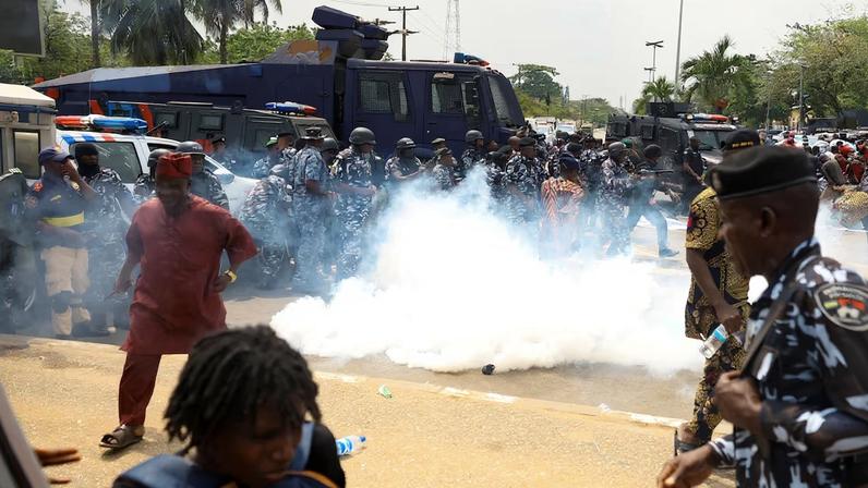 Members of the Nigerian police lob teargas canisters to disperse demonstrators during a protest by residents of Makoko riverine community over the demolition of their stilt houses in Lagos, Nigeria, January 28, 2026. REUTERS/Sodiq Adelakun