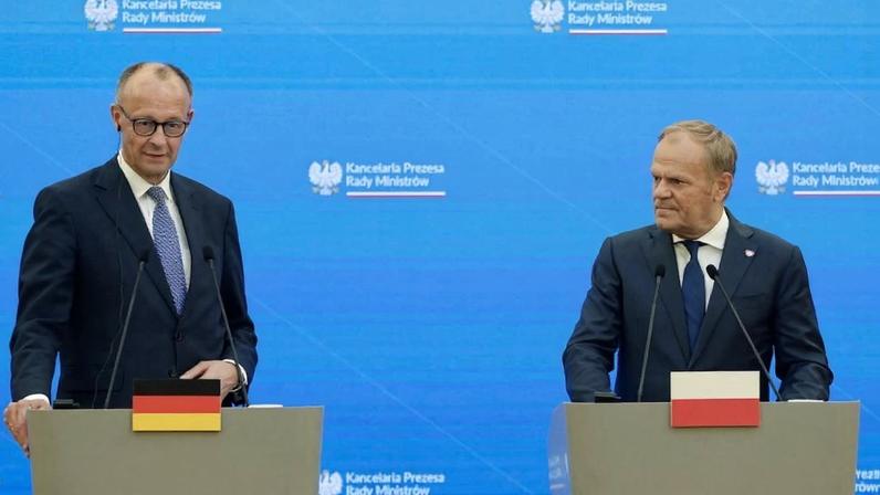 Polish Prime Minister Donald Tusk and German Chancellor Friedrich Merz address a joint press conference in Warsaw on May 7, 2025.