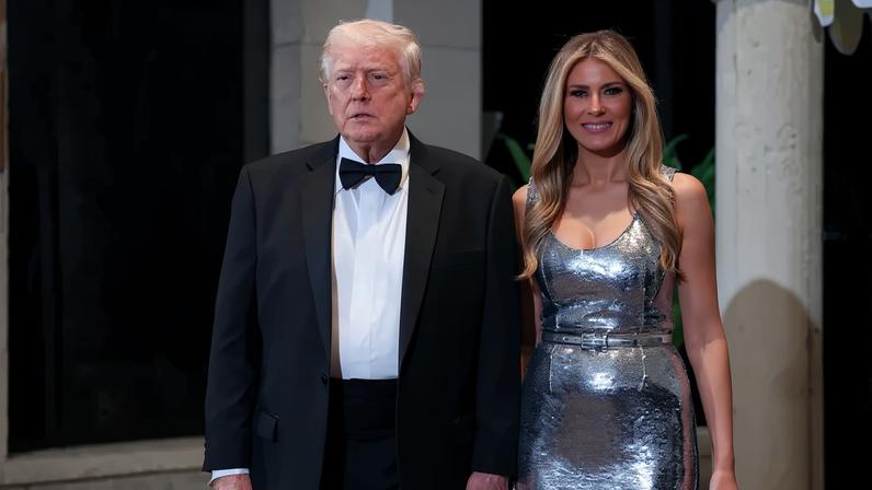 U.S. President Donald Trump and first lady Melania Trump arrive for a New Year’s Eve event at his Mar-a-Lago home on December 31, 2025 in Palm Beach, Florida.