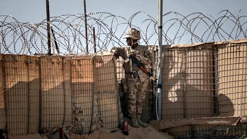 A soldier stands guard inside a military camp formerly controlled by the United Arab Emirates in Dhaba, in Yemen's southern Hadramawt province, on Jan. 20.