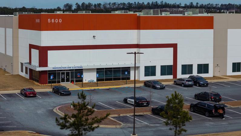 A drone picture shows the Fulton County Election Hub and Operation Center a day after the Federal Bureau of Investigation (FBI) executed a search warrant in Georgia