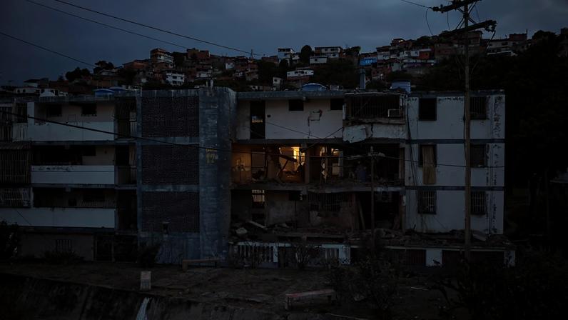 A damaged building following U.S. strikes on Venezuela
