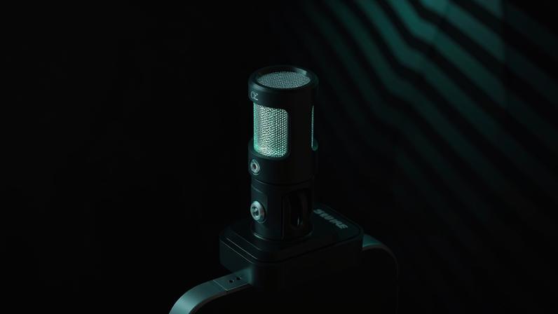 Shure MV88 USB-C being plugged into an iPhone against a black background with weird green laser accents… pew pew.