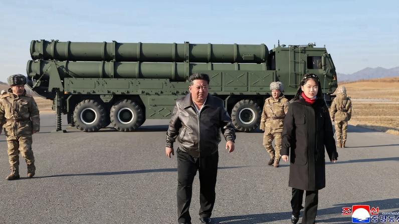 North Korean leader Kim Jong Un directs test of large-caliber multiple-rocket launch system