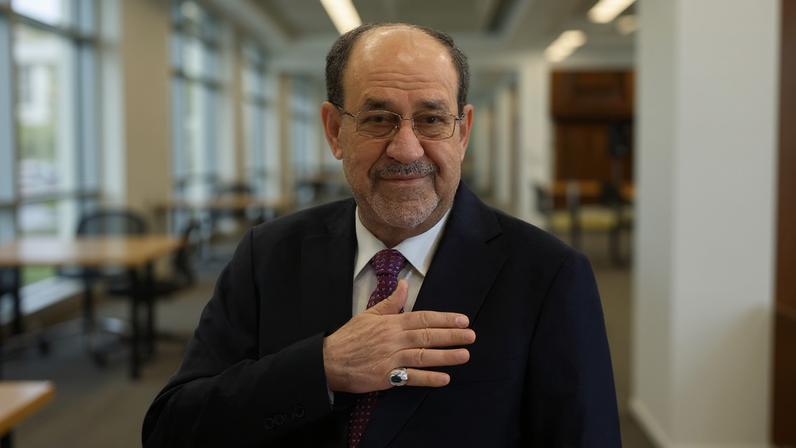 Former Iraqi Prime Minister Nouri al-Maliki reacts at a polling station inside Al-Rasheed Hotel during the parliamentary election in Baghdad, Iraq, November 11, 2025. REUTERS/Thaier Al-Sudani/File Photo