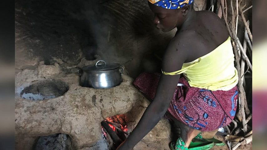 A woman uses a new cookstove in the village of Bang in the North region of Cameroon.