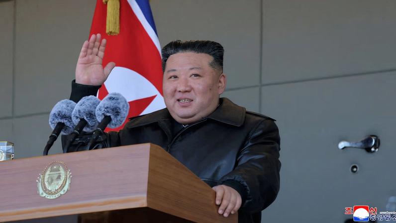 North Korean leader Kim Jong Un gestures as he visits a greenhouse farm construction site along the country's border with China