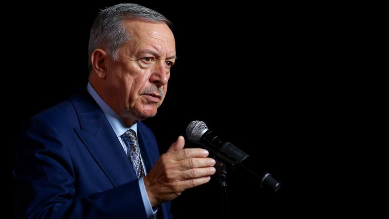 Turkey's President Tayyip Erdogan speaks to the media at the end of the G20 Leaders' Summit in Johannesburg, South Africa, November 23, 2025. REUTERS/Thomas Mukoya