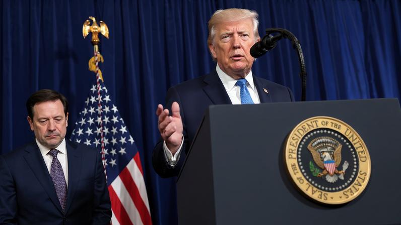 U.S. President Donald Trump speaks as Secretary of State Marco Rubio looks down during a press conference following a U.S. strike on Venezuela where President Nicolas Maduro and his wife, Cilia Flores, were captured, from Trump's Mar-a-Lago club in Palm Beach, Florida, U.S., January 3, 2026. REUTERS/Jonathan Ernst