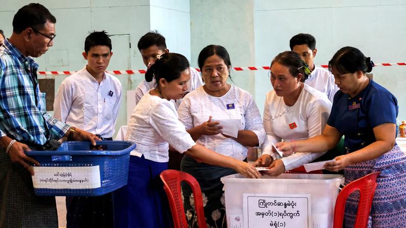Election Commission officials count ballots at a polling station during Myanmar's general election in Yangon, Myanmar, December 28, 2025. REUTERS/Stringer/File Photo