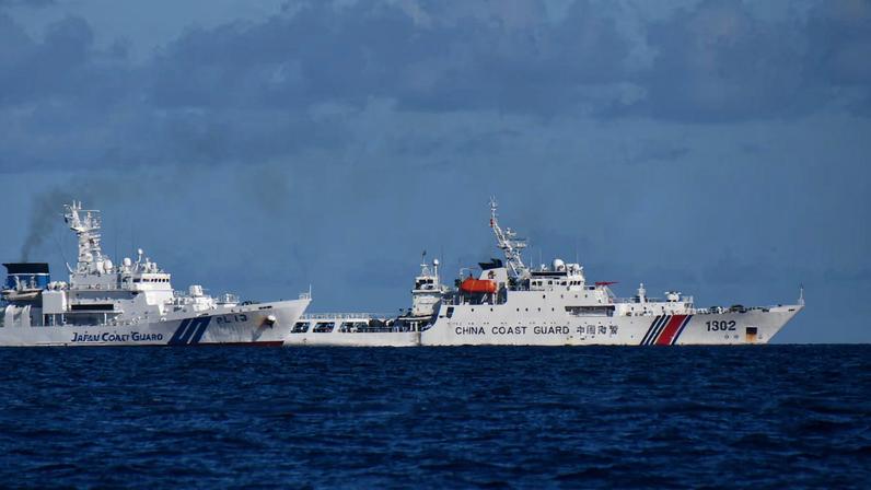 A China Coast Guard vessel sails near a Japan Coast Guard vessel around a group of disputed islands called Senkaku Islands in Japan, also known in China as Diaoyu Islands, September 14, 2025. Hitoshi Nakama/Handout via REUTERS/File Photo