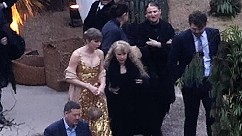 Taylor Swift, Este Haim, and Stevie Nicks at Este Haim's New Year's Eve wedding in Ojai, California.