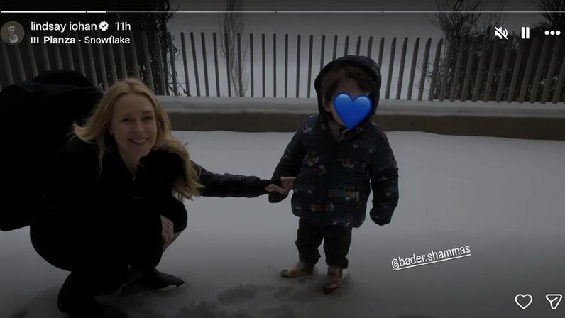 Lindsay Lohan shared a rare photo of her son, Luai, playing in the snow via her Instagram Stories Saturday.