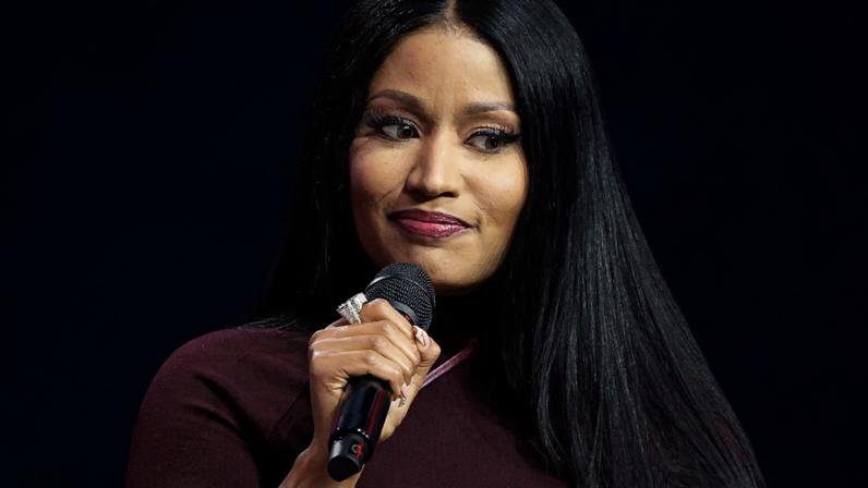 Nicki Minaj being interviewed by Erika Kirk during Turning Point USA's AmericaFest conference in Phoenix.