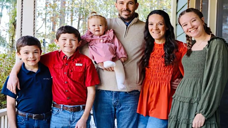 The Dowey family and their adopted daughter, Grace, who is currently in Haiti.
