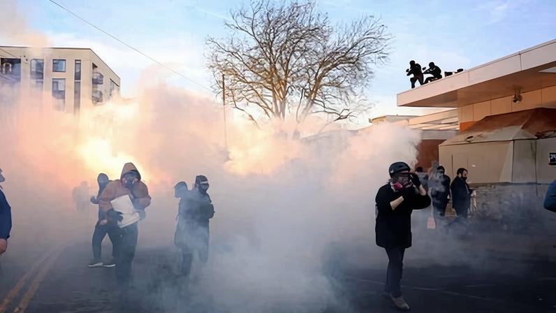 Federal agents lobbed teargas and flash bangs at protesters on 31 January in front of the South Waterfront ICE building in Portland, Oregon.