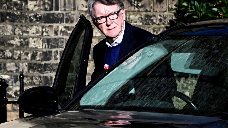 FILE PHOTO: Former British Ambassador to the U.S. Peter Mandelson enters a vehicle outside a reported residence, after police launched a misconduct in public office investigation following the release of U.S. Justice Department files linked to the late financier and convicted sex offender Jeffrey Epstein, in London, Britain, February 14, 2026. REUTERS/Chris Ratcliffe
