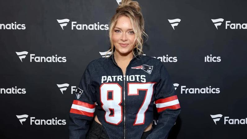 Camille Kostek in a Patriots jacket at the 2026 Fanatics Super Bowl Party.