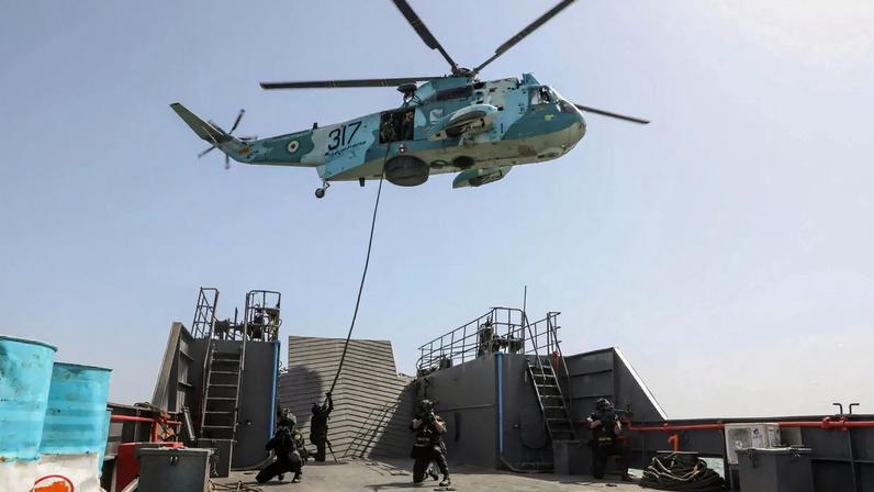 Members of the Iranian Army attend the joint Navy exercise of Iran and Russia in southern Iran.