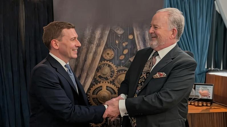 George Cottrell, left, and Lawrence Burke Files at the launch of their book, How to Launder Money, at the Raffles hotel in London.