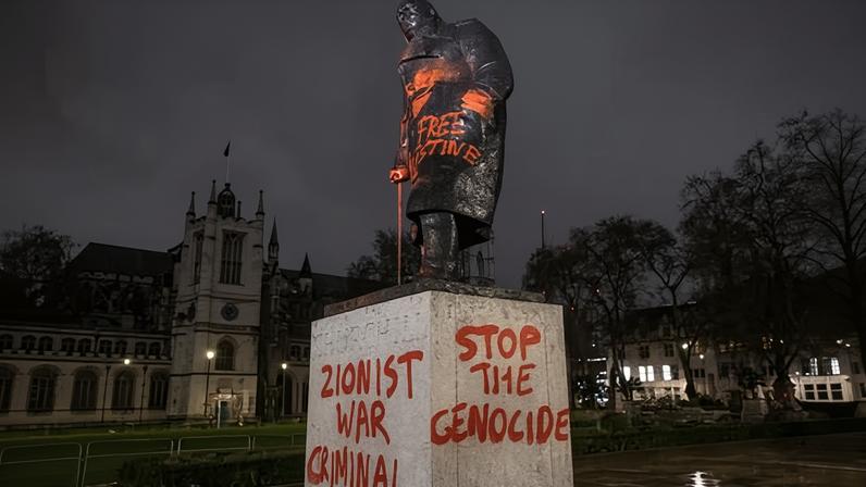 The Winston Churchill statue in Parliament Square was vandalised in the early hours of Friday morning