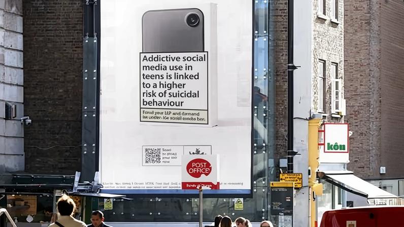 Mumsnet social media billboard campaign, 26 February 2026. Ad text reads: 'Addictive social media use in teens is linked to a higher risk of suicidal behaviour'