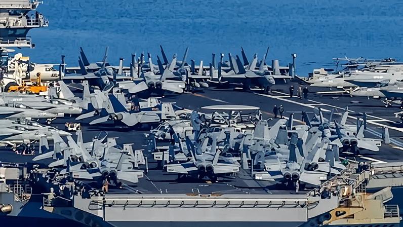 The USS Gerald R Ford off Crete. The huge warship leads one of two carrier groups within striking range of Iran.