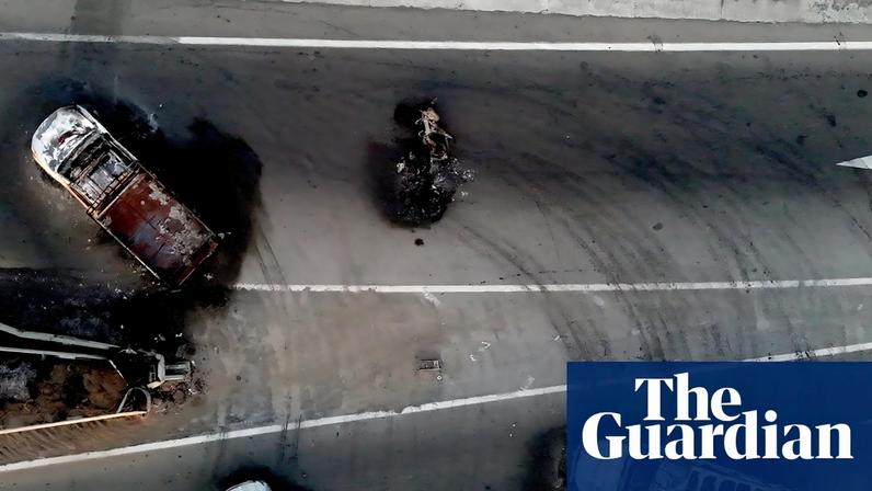 Burned cars and trucks, allegedly set on fire by organised crime groups in response to an operation to arrest a high-priority security target, on a highway near Acatlan de Juarez, Jalisco state, Mexico.