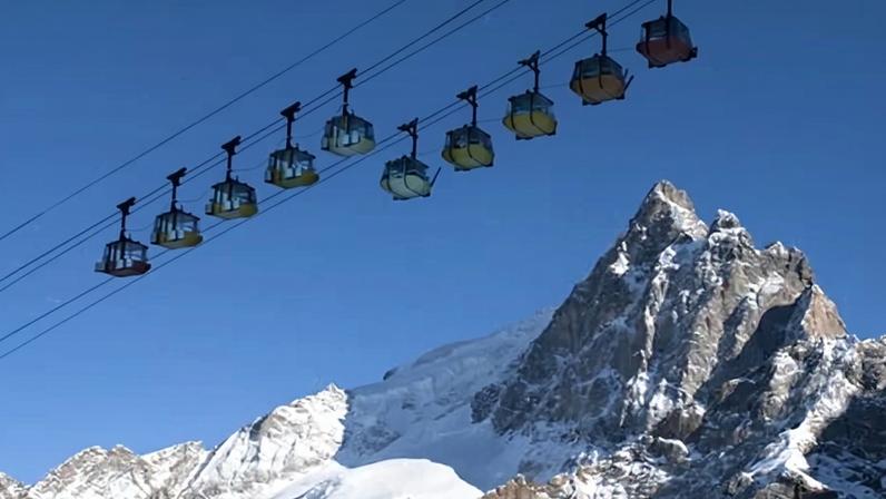 An earlier view of La Grave, France, with La Meije mountain on the background. The weather bureau said the avalanche risk remained high.
