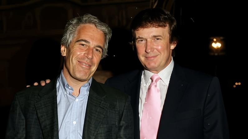 Jeffrey Epstein and Donald Trump pose together at the Mar-a-Lago estate in Palm Beach, Florida, on 22 February 1997.