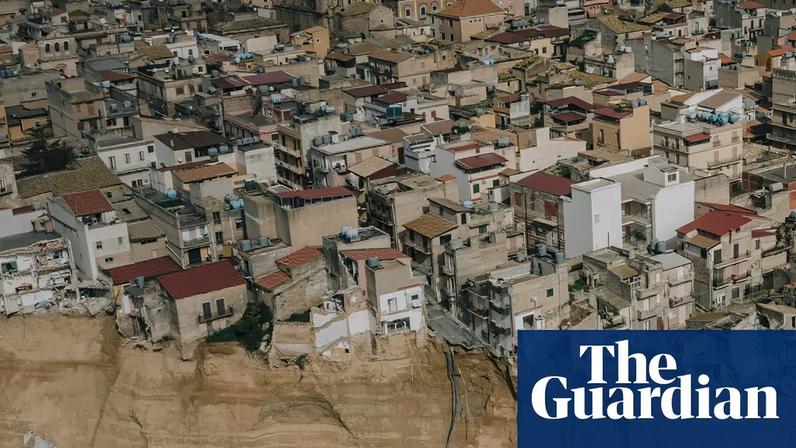 A drone view of Niscemi, where dozens of houses hang precariously over the edge of a cliff. Photograph: Alessio Mamo/The Guardian