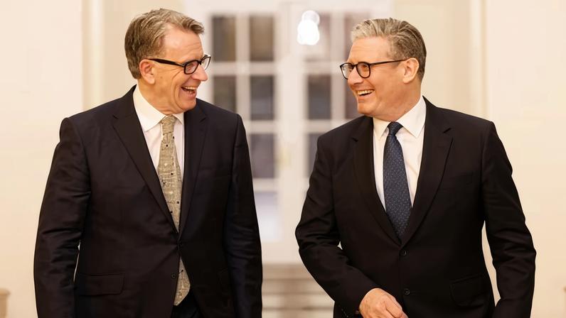 Keir Starmer walks with Peter Mandelson in 2025