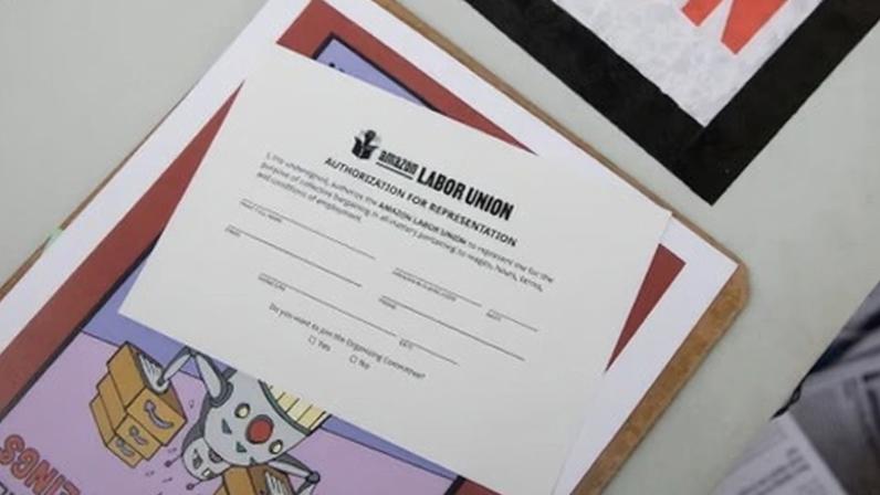 Amazon labor union authorization forms outside an Amazon fulfillment center in the Staten Island borough of New York, on 7 February 2022.