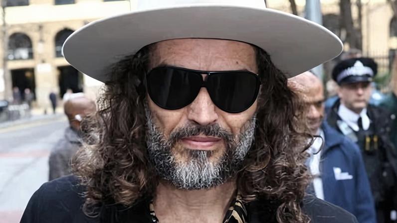 Russell Brand leaving the hearing at Southwark crown court on Tuesday.