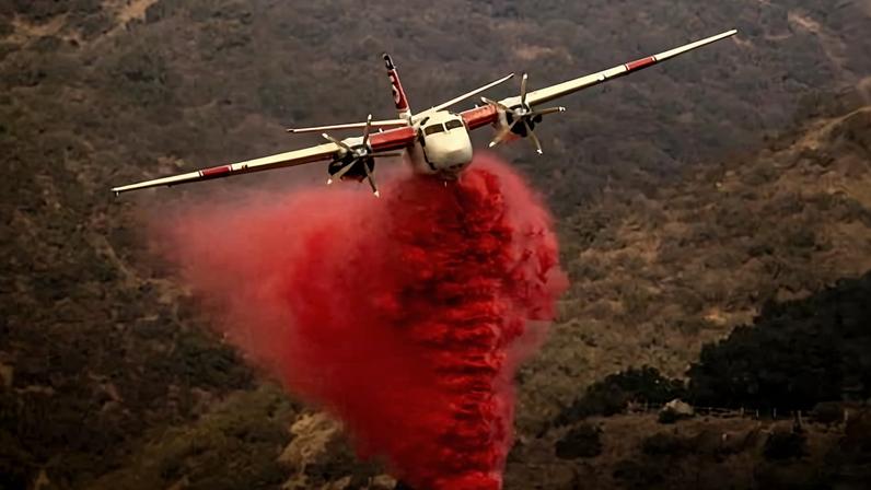 A Cal Fire S-2T firefighting tanker releases retardant while battling the Palisades Fire in the Mandeville Canyon neighborhood of Los Angeles, Calif., Saturday, Jan. 11, 2025. **according to reporting, the proposed amendment would remove restrictions on chemicals used in fire suppression, per the enviro pub The New Lede (https://www.thenewlede.org/2026/01/tsca-chemical-regulation-epa-house-hearing/)**