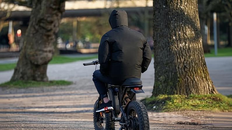 Person sitting on fatbike style ebike