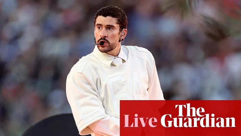 Bad Bunny performs onstage at the Super Bowl half-time show.