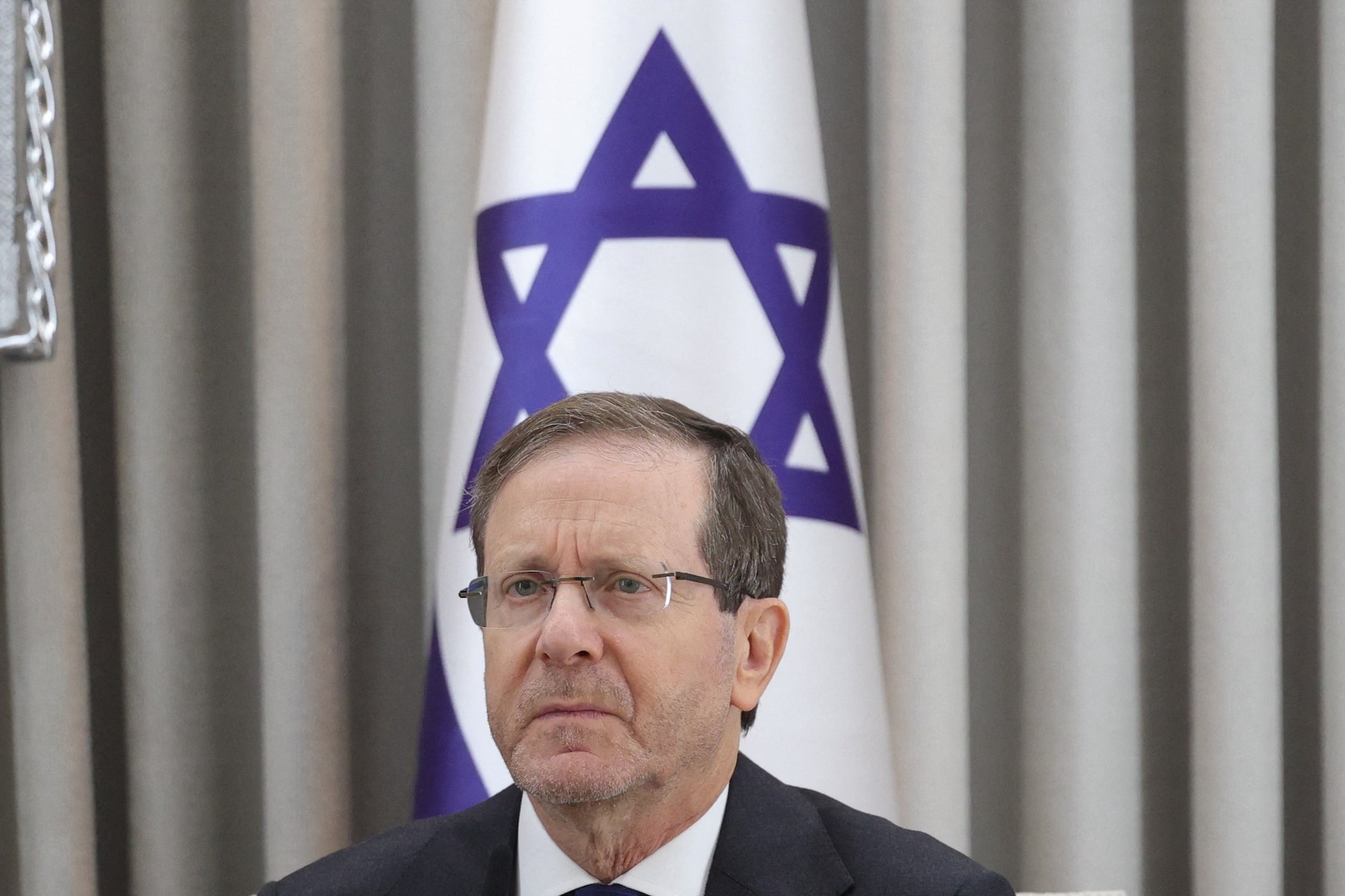 Israeli President Isaac Herzog looks on during a meeting with German Chancellor Friedrich Merz at the President's residence in Jerusalem, December 6, 2025. Abir Sultan/Pool via REUTERS