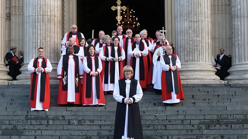 Sarah Mullally, who has supported the church’s racial justice work, with bishops at St Paul’s Cathedral in London on Wednesday after becoming the first female archbishop of Canterbury.