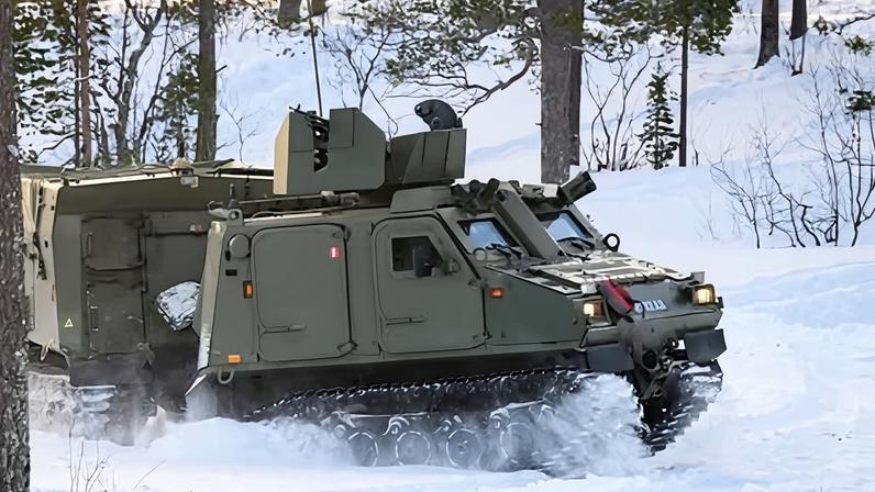 Members of the Royal Marines armoured support group run through drills in Skjold, Norway.