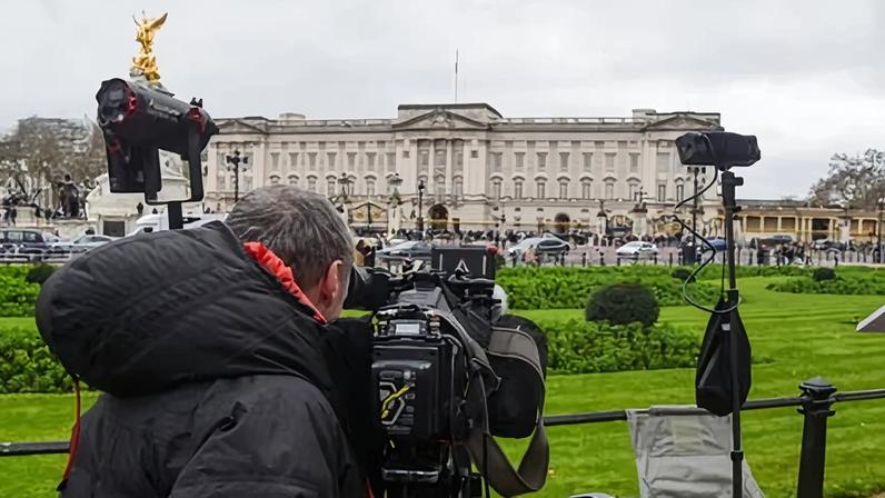 Media outside Buckingham Palace as Andrew Mountbatten-Windsor is arrested on suspicion of misconduct in public office