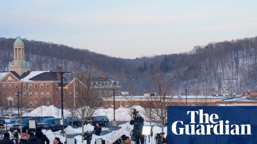 The press wait outside the Chappaqua Performing Arts Center in New York on Thursday for Hillary Clinton, who was testifying before House lawmakers.