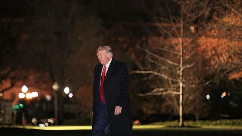U.S. President Donald Trump walks as he arrives from travel to West Point, New York, on the South Lawn at the White House in Washington, U.S., December 12, 2020. REUTERS/Cheriss May