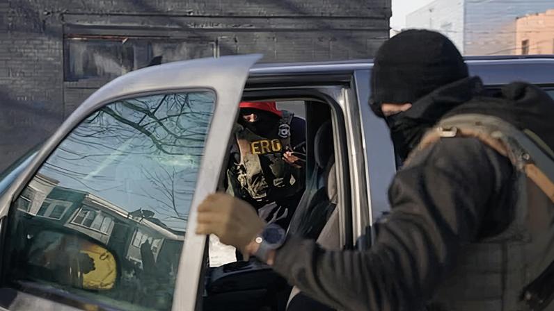 Border agent opens car door