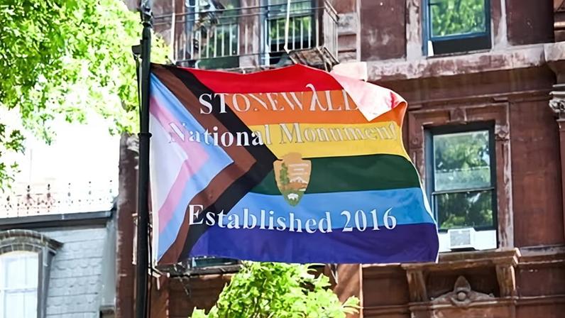 A Pride flag is seen outside Stonewall national monument during the New York City Pride parade on 26 June 2022.