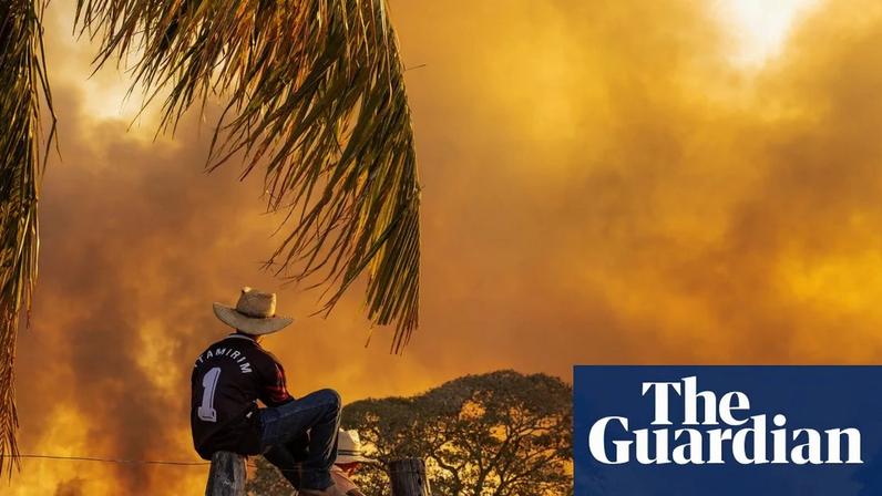 Firefighters on their way back to the wildfire on Santa Tereza Ranch in Mato Grosso, 2020. Photograph: Lalo de Almeida