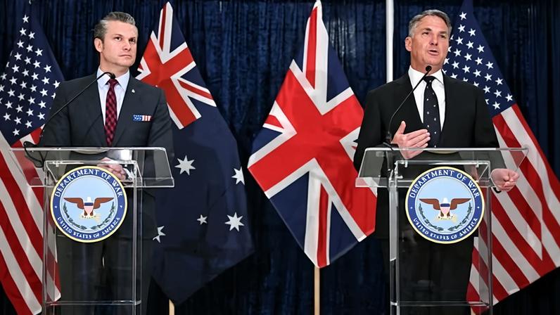 US defence secretary Pete Hegseth and Australian defence minister Richard Marles in Washington DC in December. A new US congressional report explores the option of not delivering any Aukus nuclear submarines to Australia.