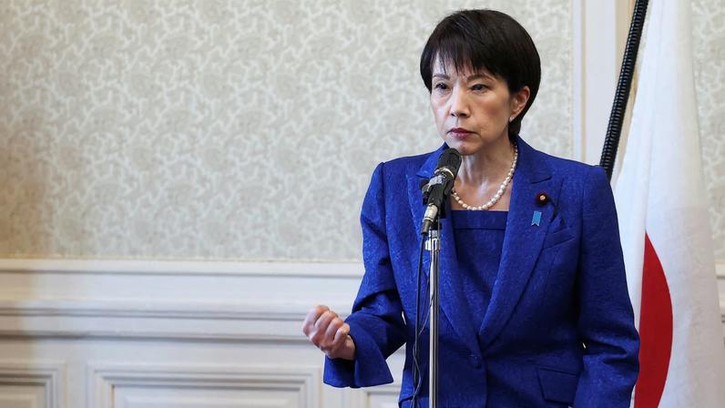 Japan's Prime Minister and ruling Liberal Democratic Party (LDP) leader, Sanae Takaichi, makes a fist as she addresses LDP lawmakers during the party lawmakers' meeting ahead of the dissolution of the lower house of parliament in Tokyo, Japan, January 23, 2026. REUTERS/Issei Kato